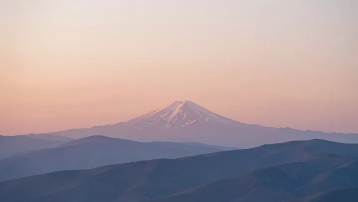 Why Mountain Summits Stay Frozen Above Heat