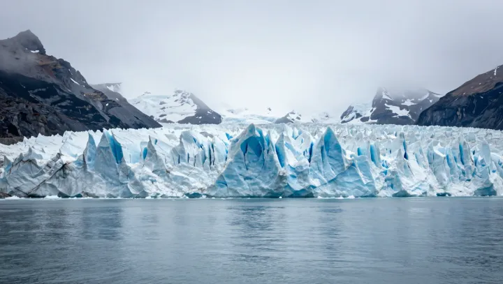 How Solid Glaciers Learn To Flow
