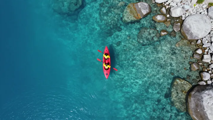 The Quiet Physics of a Fast Tandem Kayak