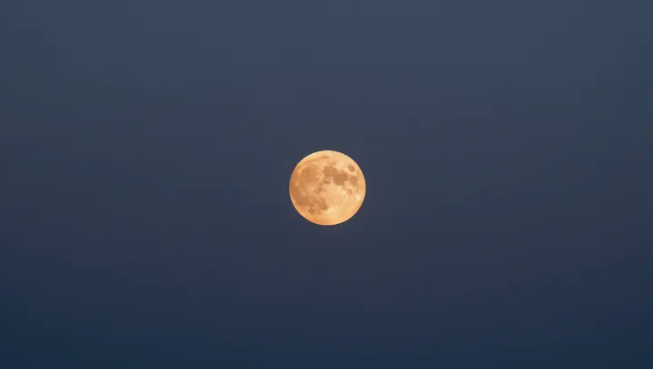 Why the Moon Sometimes Glows Blood‑Orange