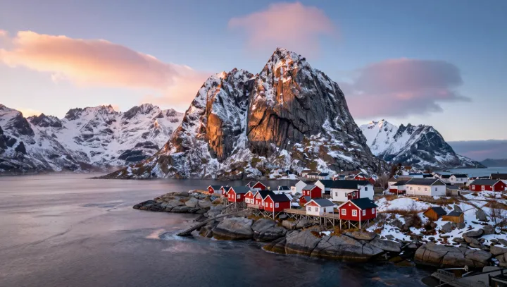 Fragile Fjord Village Under a Sheer Wall
