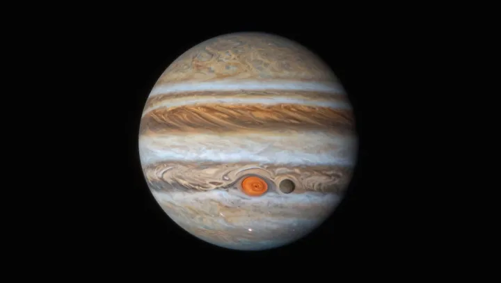 Jupiter's Shrinking Giant